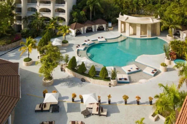 Luxury beachfront Lifestyle Hotel Puerto Plata, Dominican Republic, featuring ocean views, modern suites, pools, and tropical landscaping.