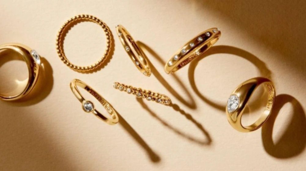 A close-up of a hand wearing a sleek, modern lifestyle ring, symbolizing both personal style and everyday practicality.