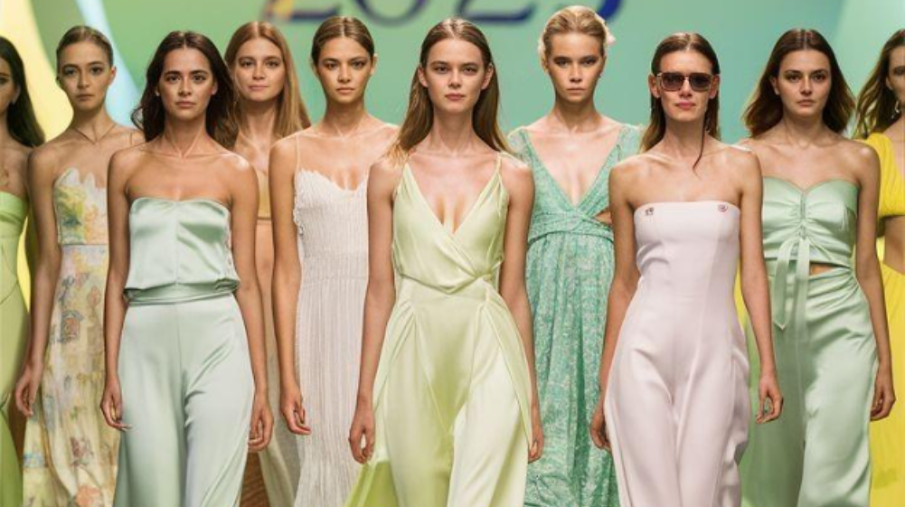 A collage of models wearing key Summer 2025 Fashion Trends including capri pants, ballet-inspired outfits, monochrome sets, and coastal chic styles.