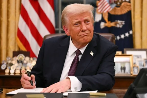 Former President Donald Trump at a press conference, with digital currency icons and blockchain graphics in the background—symbolizing Trump's Executive Order on Crypto.