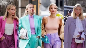 Leonie Hanne and A group of stylish fashion influencers posing outdoors in trendy outfits during fashion week.

