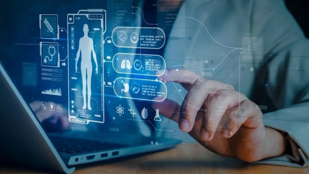 User accessing the Health First Patient Portal on a laptop to view medical records and appointments.