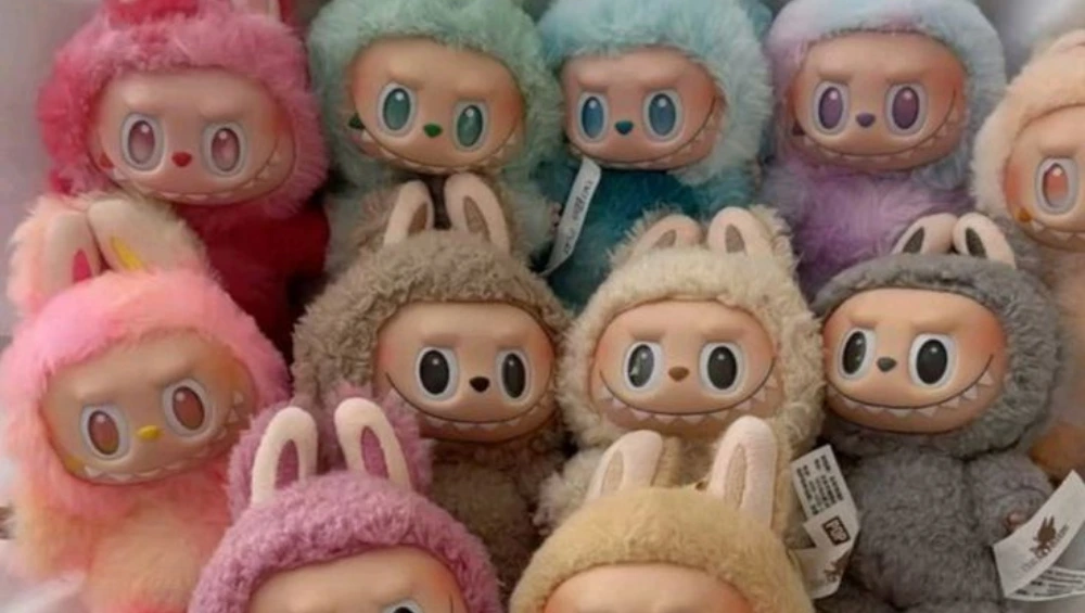 Cute collectible toy character Labubu with mischievous smile, often featured in discussions about why Labubu is so popular among designer toy fans.