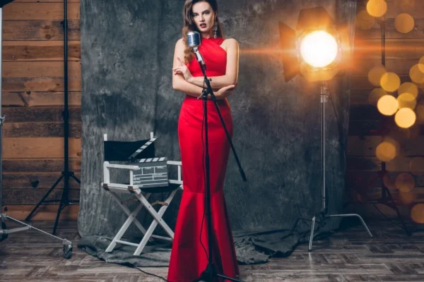 Glamorous celebrities walking red carpet in stunning designer gowns at major award shows, showcasing celebrity event dress to impress styles