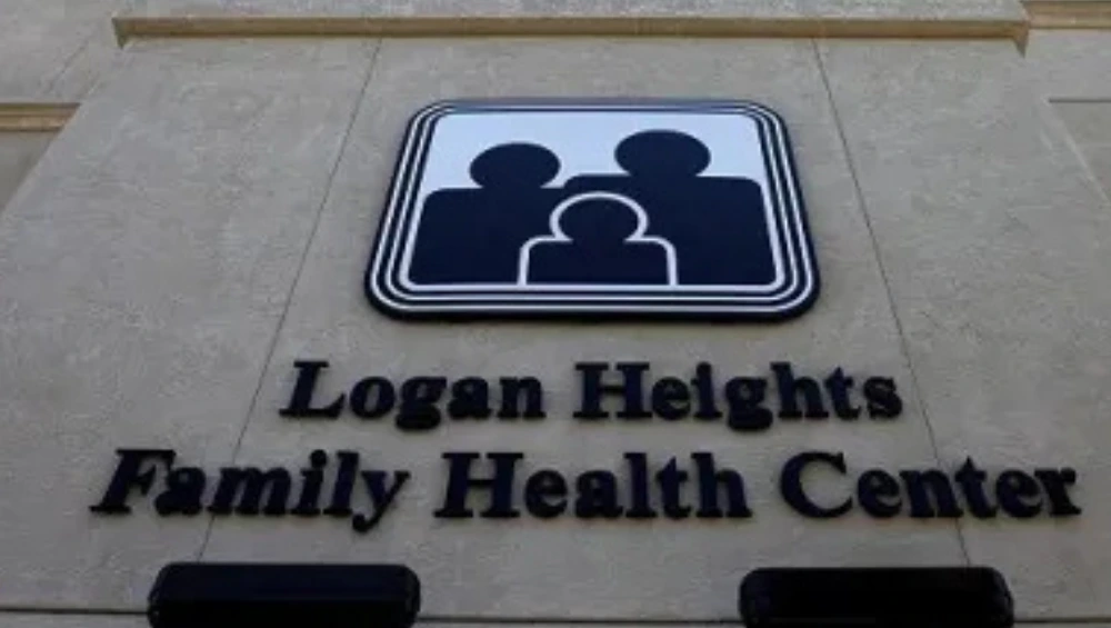 Front façade of the Logan Heights Family Health Center building at 1809 National Ave in San Diego, showing its multi-story exterior under clear skies.