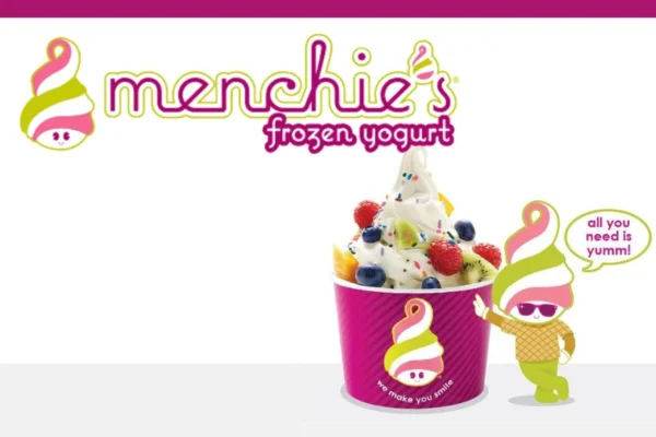 Menchies business hours clearly posted on the entrance — check before visiting for your next frozen treat.