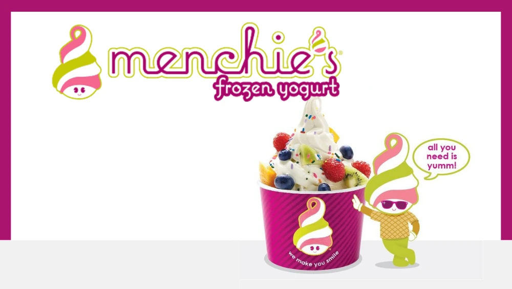 Menchies business hours clearly posted on the entrance — check before visiting for your next frozen treat.
