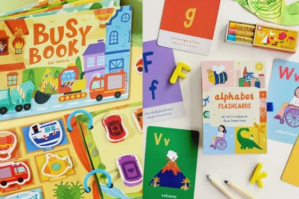 A colorful My Busy Books set featuring a storybook, collectible figurines, and a fold-out playmat on display.