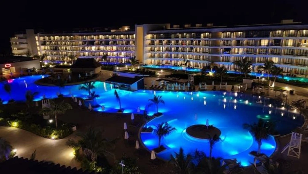 Aerial view of Ocean Coral Spring resort in Jamaica — luxury all-inclusive beachfront resort with pools, palm trees, and ocean views