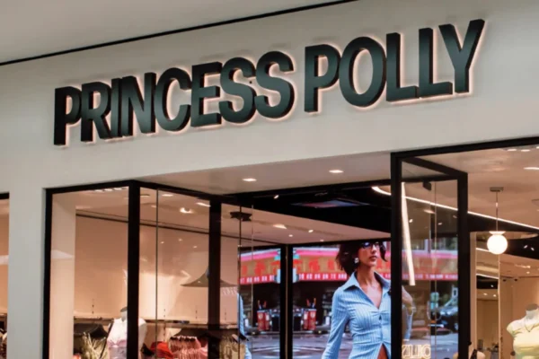 Exterior storefront of Princess Polly Fashion Valley , featuring the bold brand signage above a bright and inviting mall entrance with visible mannequins inside.