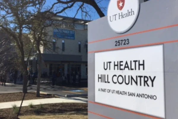 Front entrance of UT Health Hill Country clinic, a modern medical facility serving the Texas Hill Country community.
