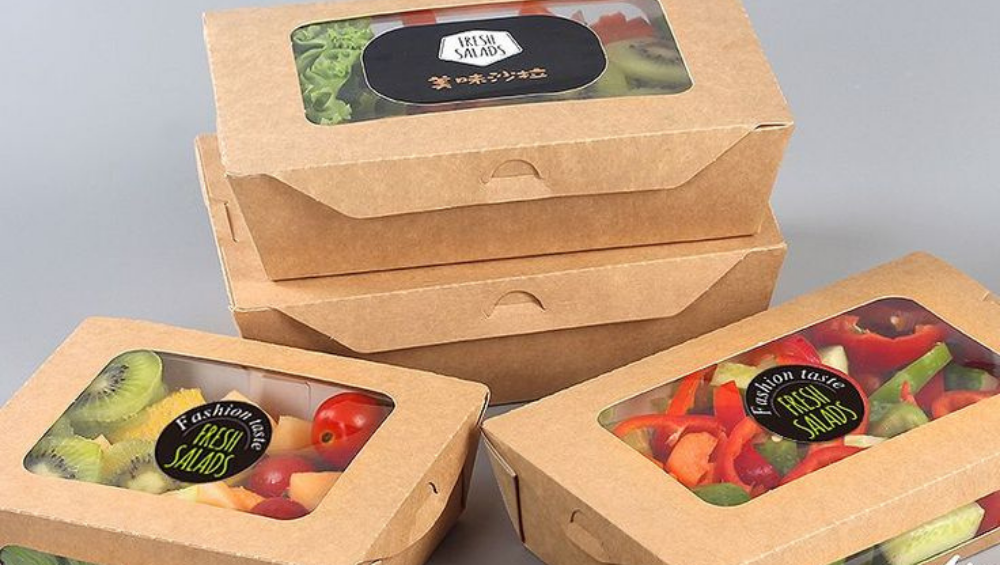 Eco-friendly Pappedeckel (cardboard lid) on a sustainable food container, showcasing biodegradable packaging solutions
